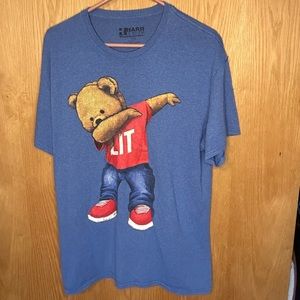 Blue shirt with dabbing bear